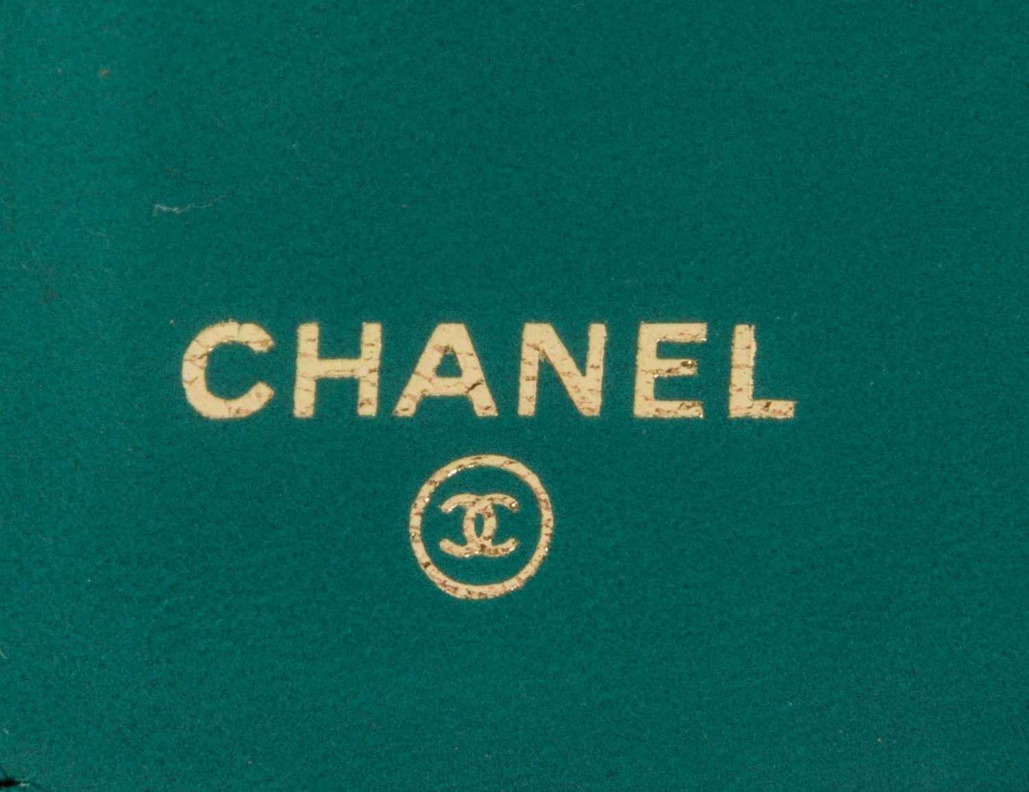 A Chanel Emerald Quilted Calfskin Leather Wallet, 7.25" x 4" x 1".