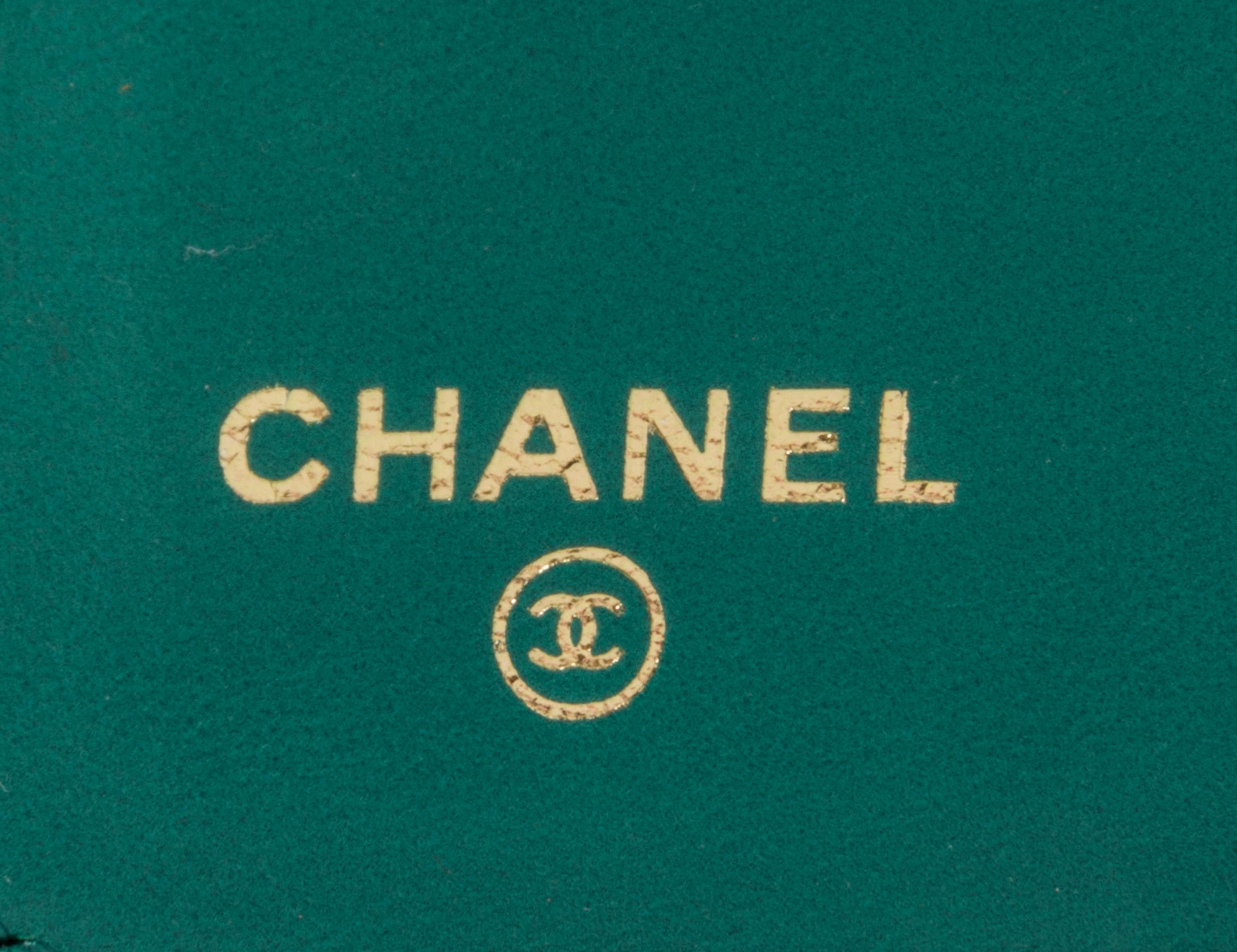 A Chanel Emerald Quilted Calfskin Leather Wallet, 7.25" x 4" x 1".