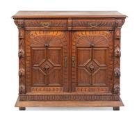 A Renaissance Revival Carved Oak Cabinet