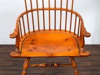 A D.R. Dimes Benchmark Turned and Volute Carved Tiger Maple and Pine Comb-Back Windsor Armchair