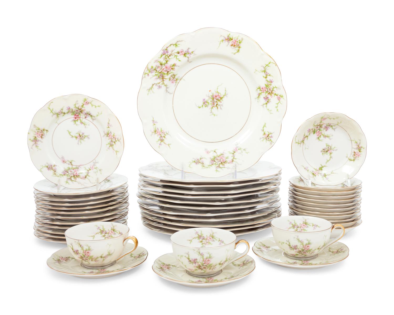 A Theodore Haviland Rosalinde Porcelain Dinner Service