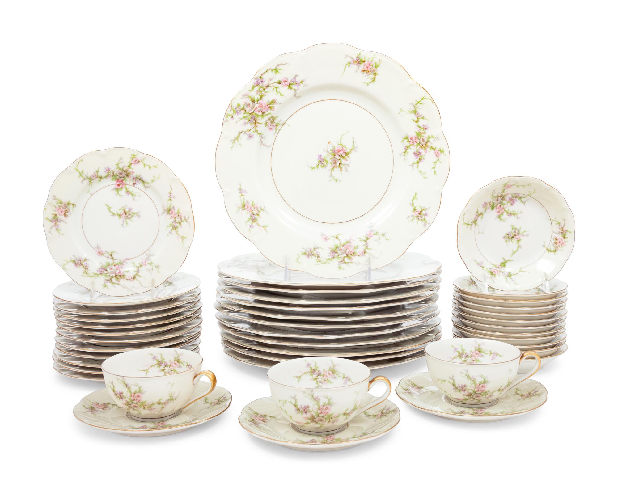 A Theodore Haviland Rosalinde Porcelain Dinner Service
