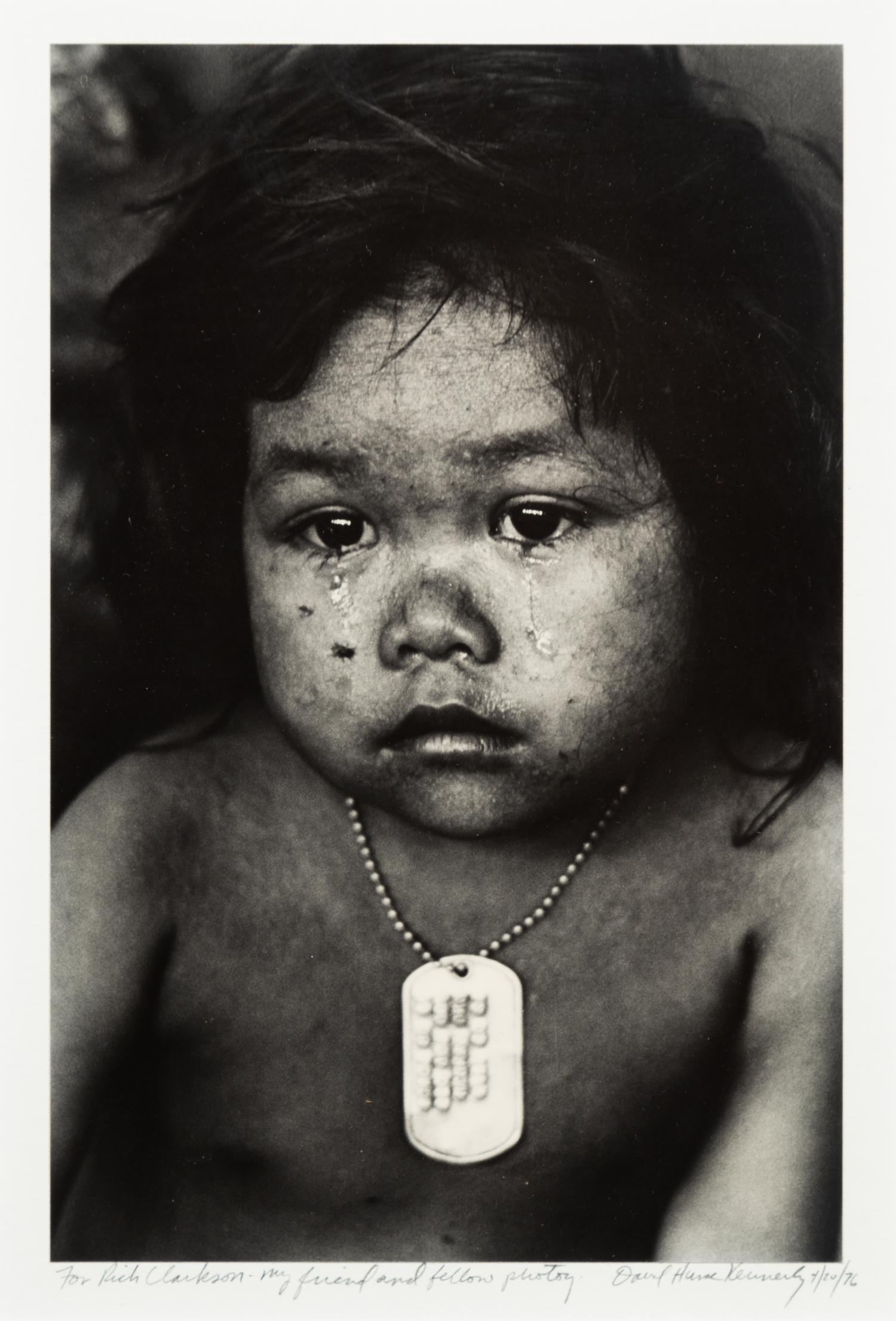 David Hume Kennerly, (American, b. 1947), Refugee Girl wearing US Dog Tag, Phnom Penh, Cambodia, 1976