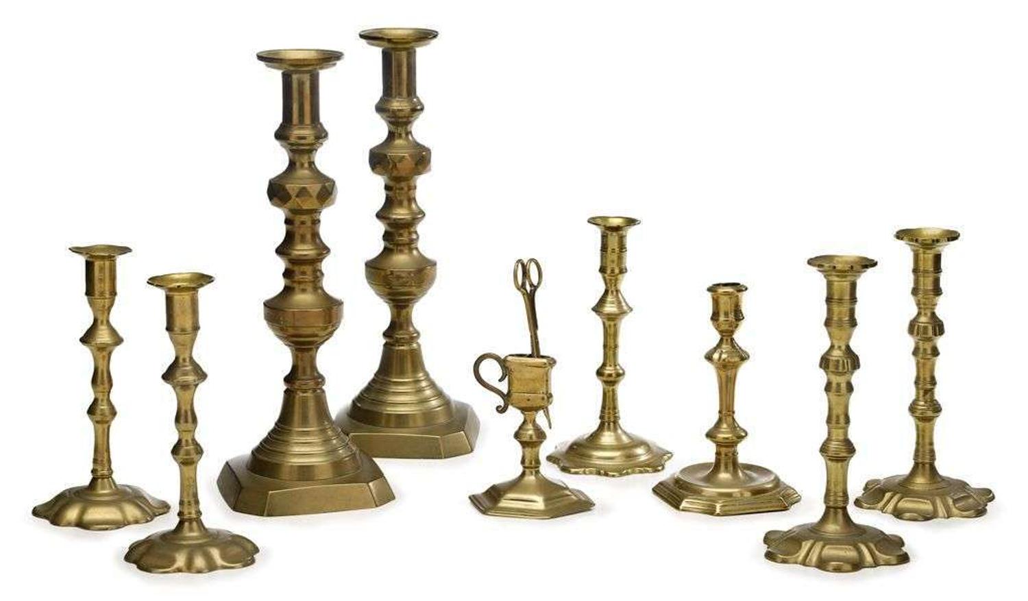 Group of brass candlesticks 18th century and later