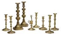 Group of brass candlesticks 18th century and later