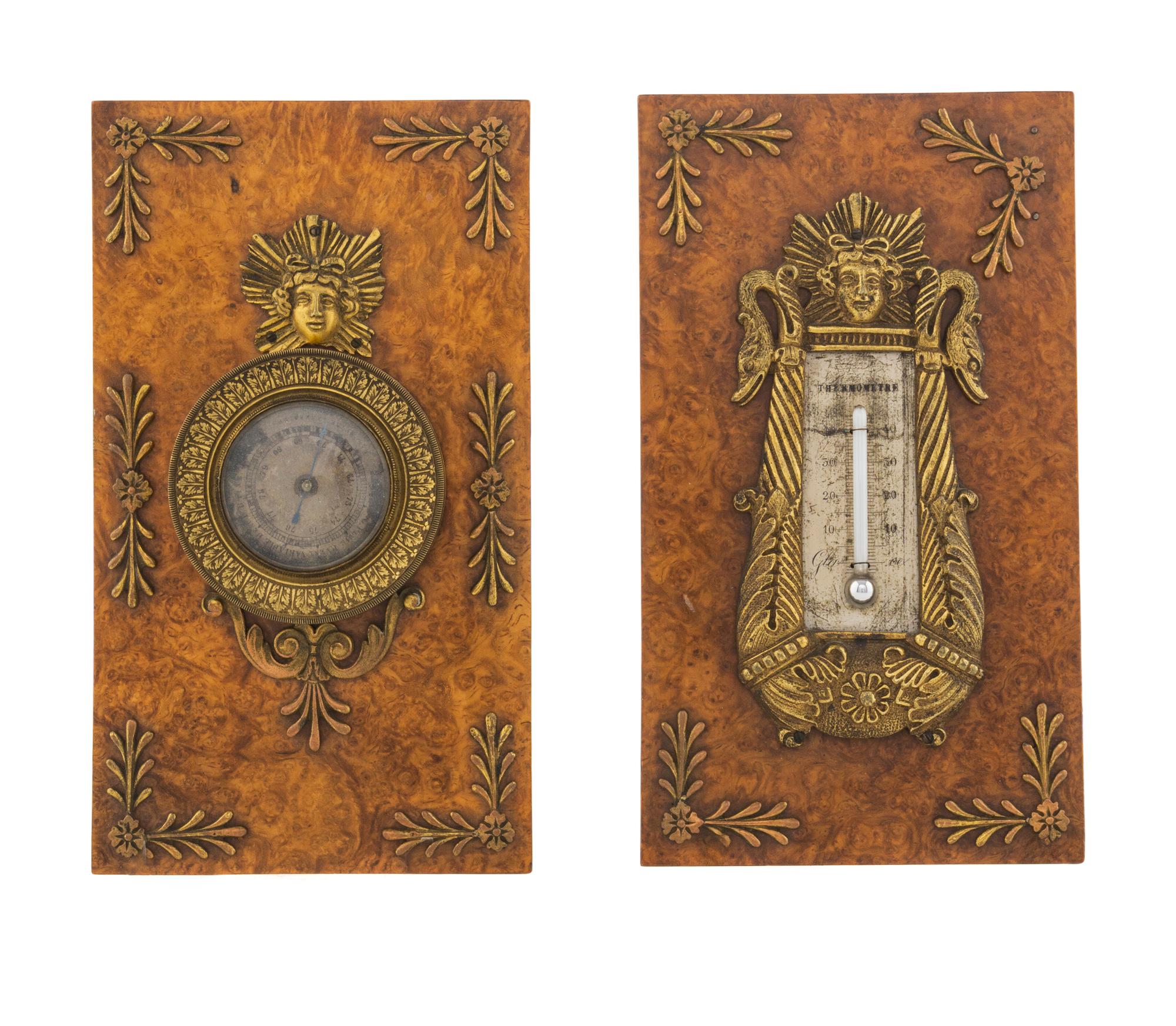 An Empire Gilt Bronze and Burlwood Desk Thermometer and Barometer Set