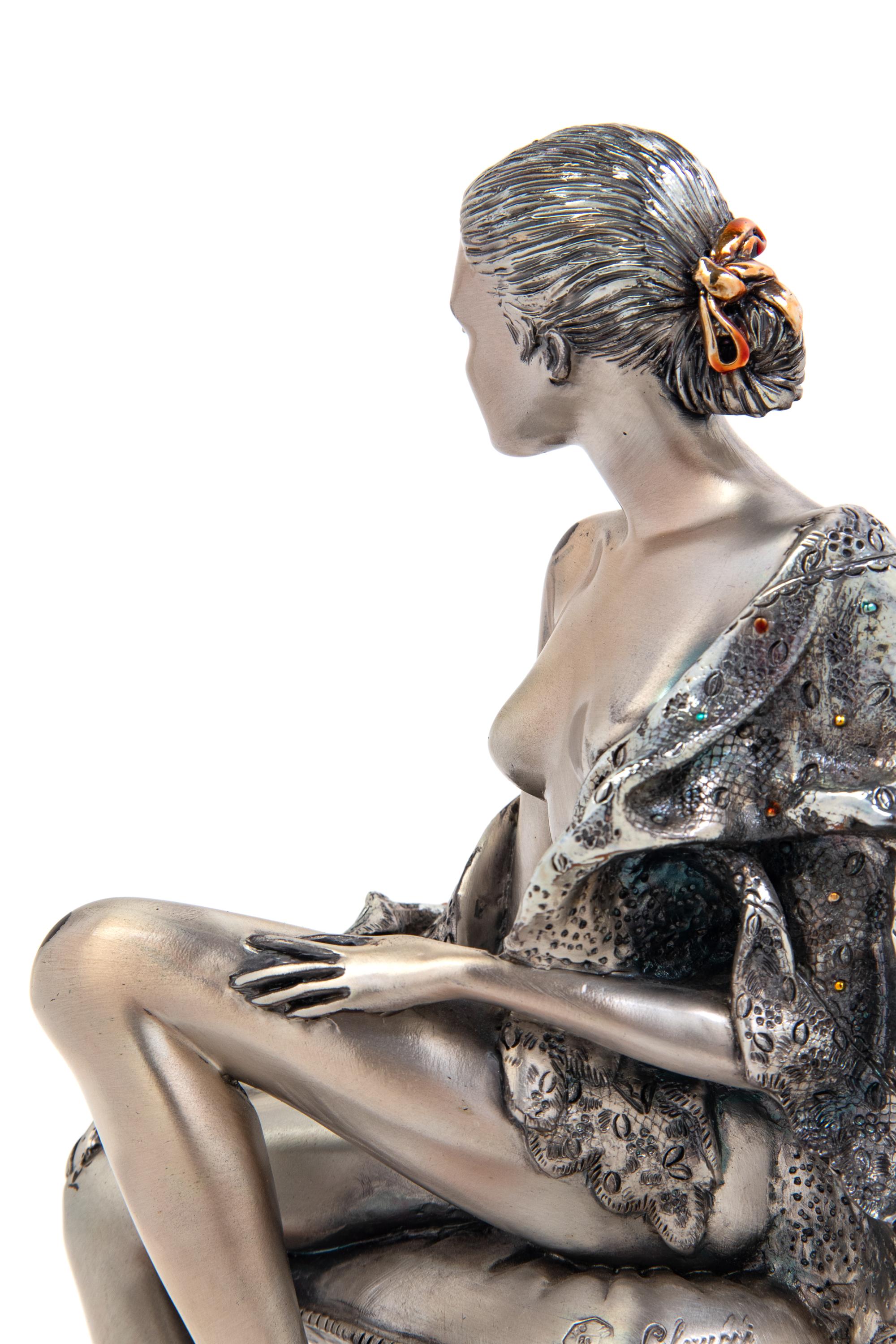 An Italian Silver Figure of a Lady