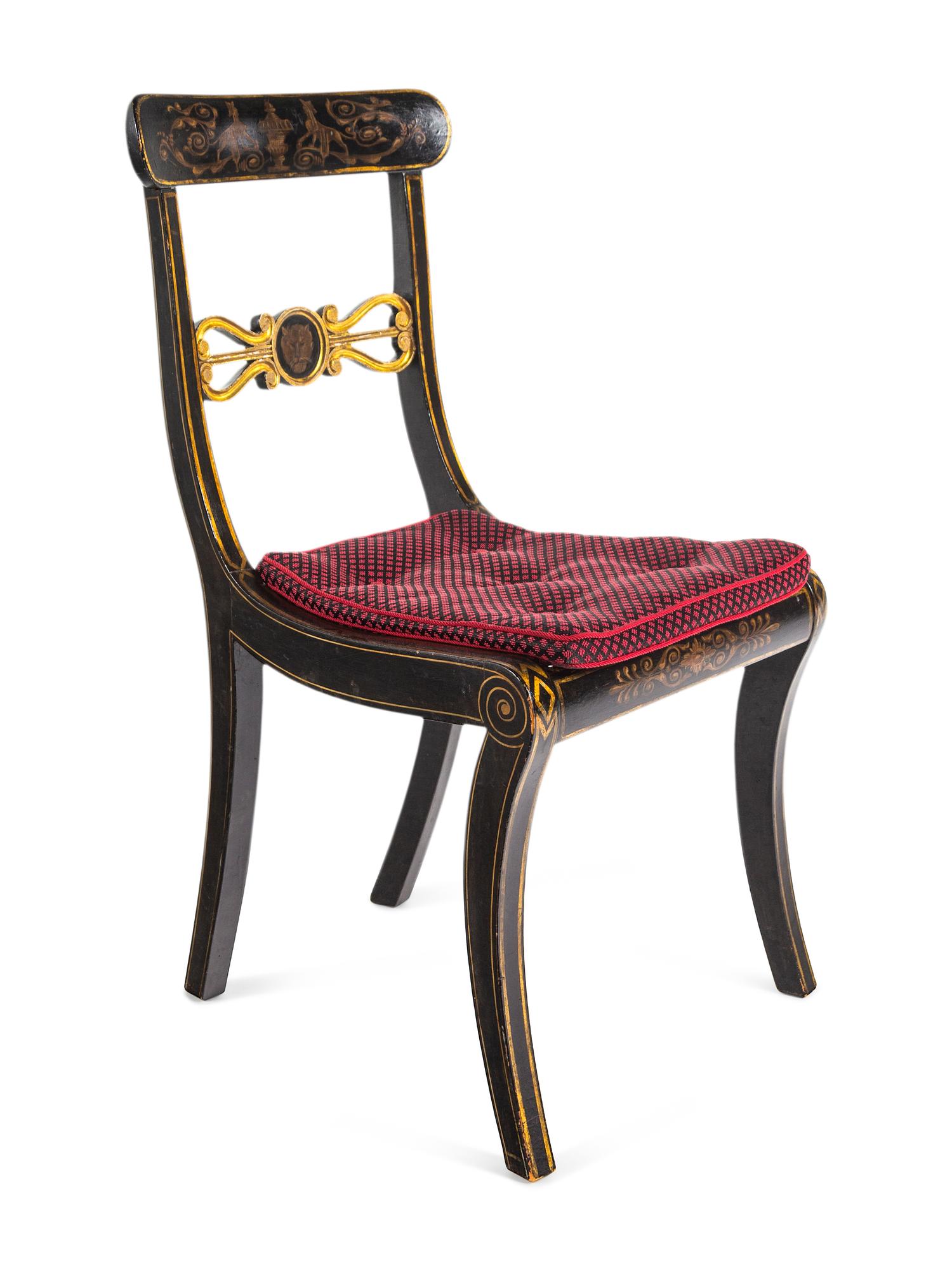 A Set of Eight Regency Black-Painted and Parcel-Gilt Dining Chairs