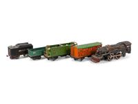 A Lionel 385E Loco Engine and Tender, Three Lionel Train Cars, Four American Flyer Line Cars and Other Accessories