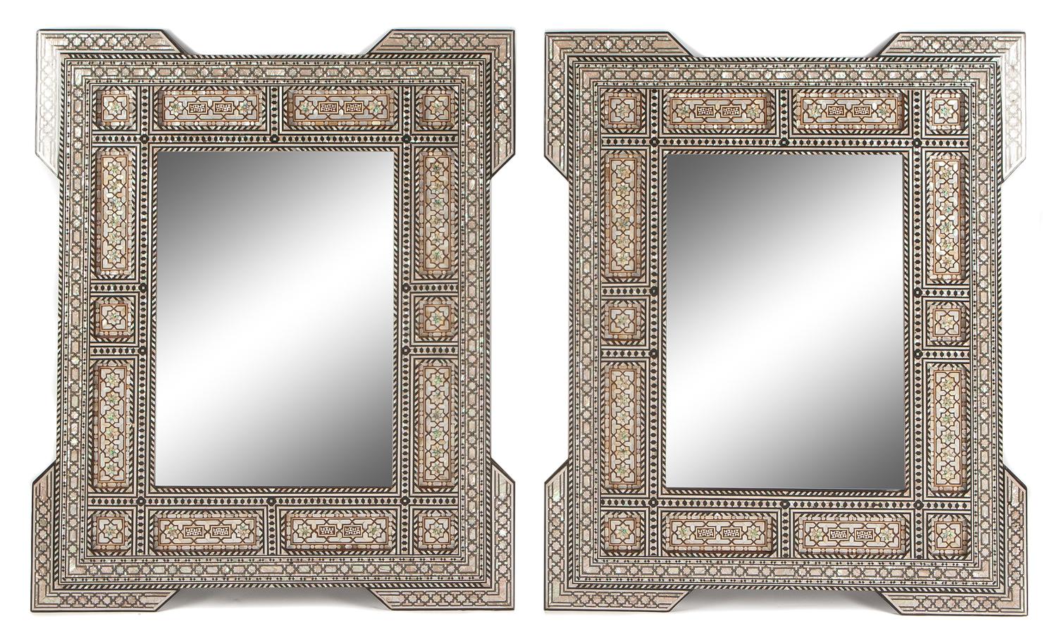 A Pair of Moorish Style Mother-of-Pearl Inlaid Mirrors Height 46 x width 37 1/2 inches.