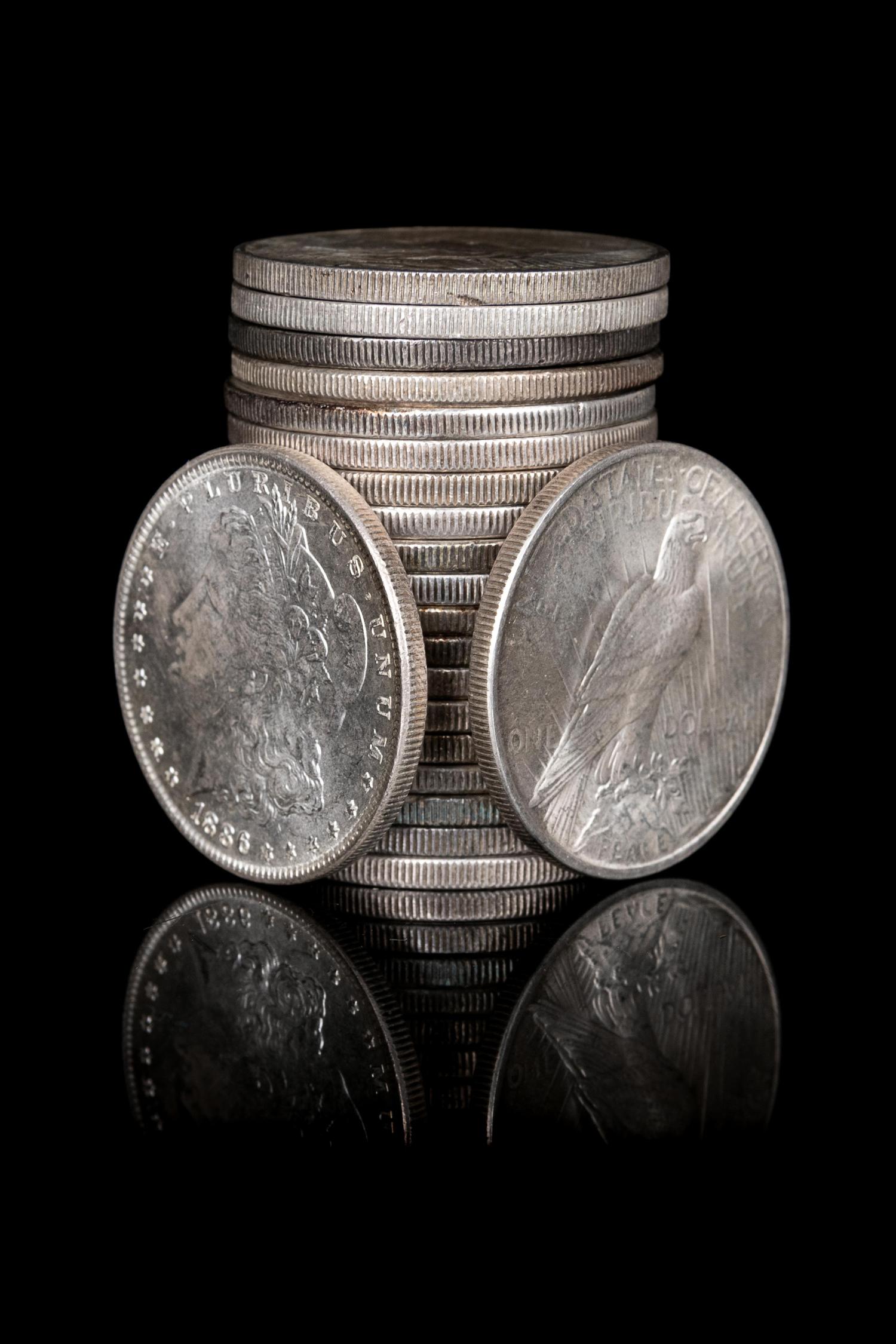 A Group of Twenty-One Morgan and Peace $1 Coins