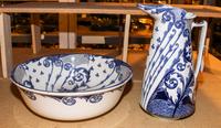 A Royal Doulton Pottery Pitcher and Basin. Height of pitcher 14 1/2 inches.