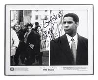 (Celebrity) A group of 16 autographed celebrity photos, comprising: