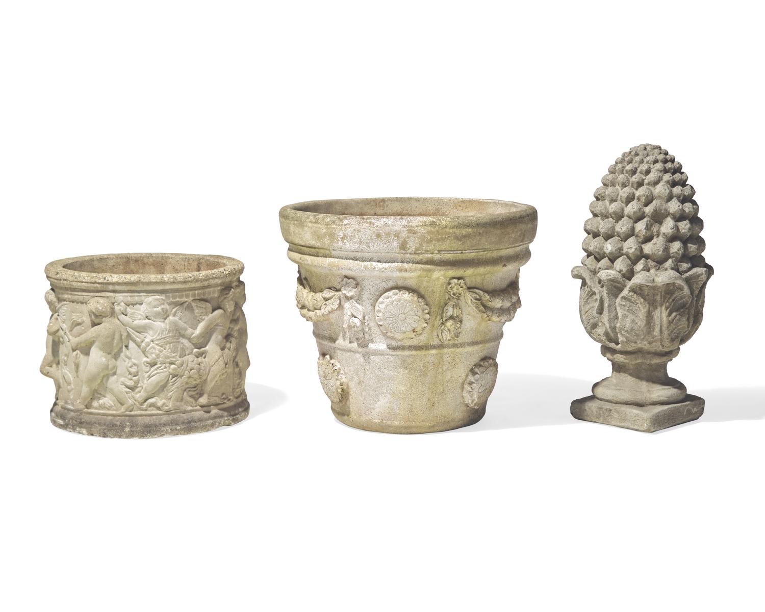 A group of three cast stone and resin garden pots and pineapple finial, 20th century