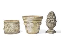 A group of three cast stone and resin garden pots and pineapple finial, 20th century