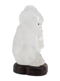 A Carved Rock Crystal Model of a Seated Monkey