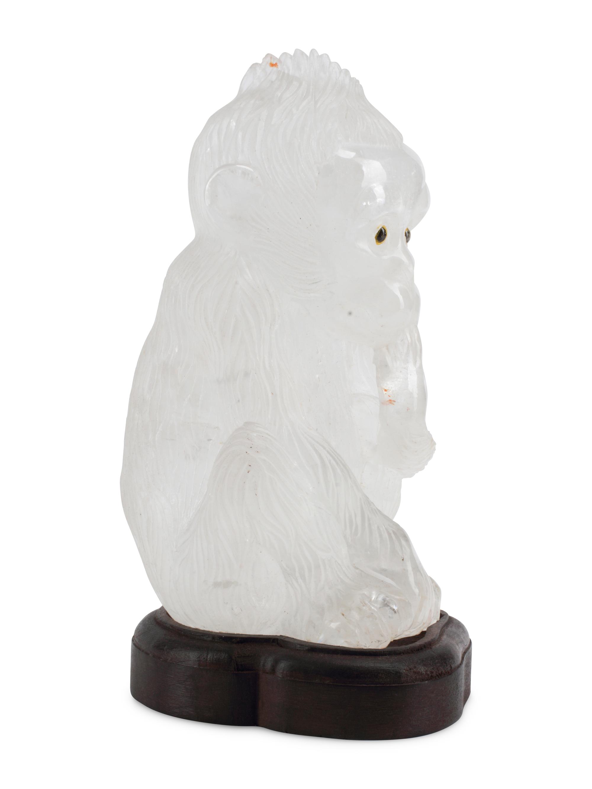 A Carved Rock Crystal Model of a Seated Monkey