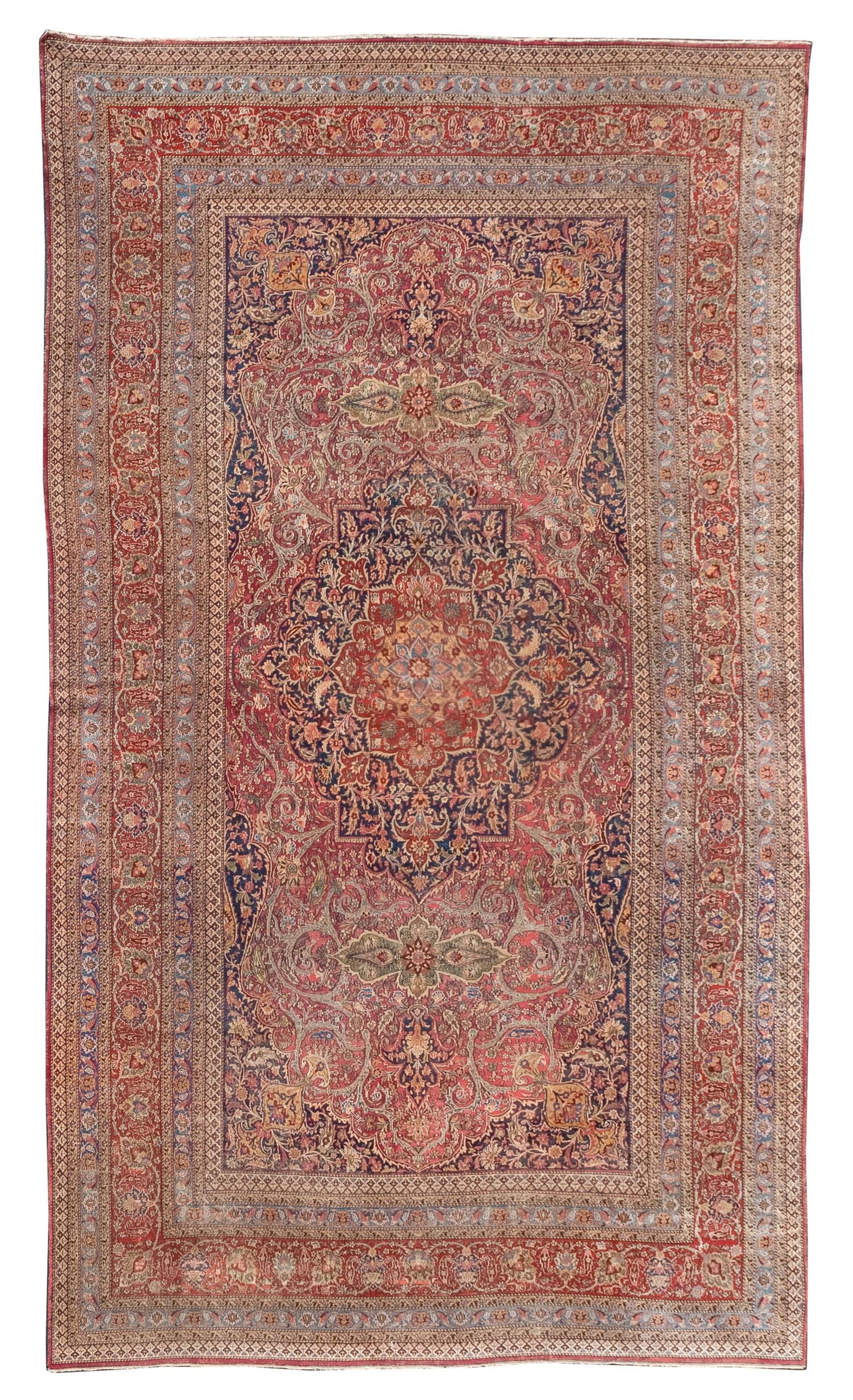 A Meshed Wool Rug 11 feet 4 inches x 22 feet 9 inches. — EARLY 20TH CENTURY