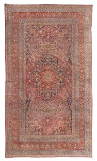 A Meshed Wool Rug 11 feet 4 inches x 22 feet 9 inches. — EARLY 20TH CENTURY