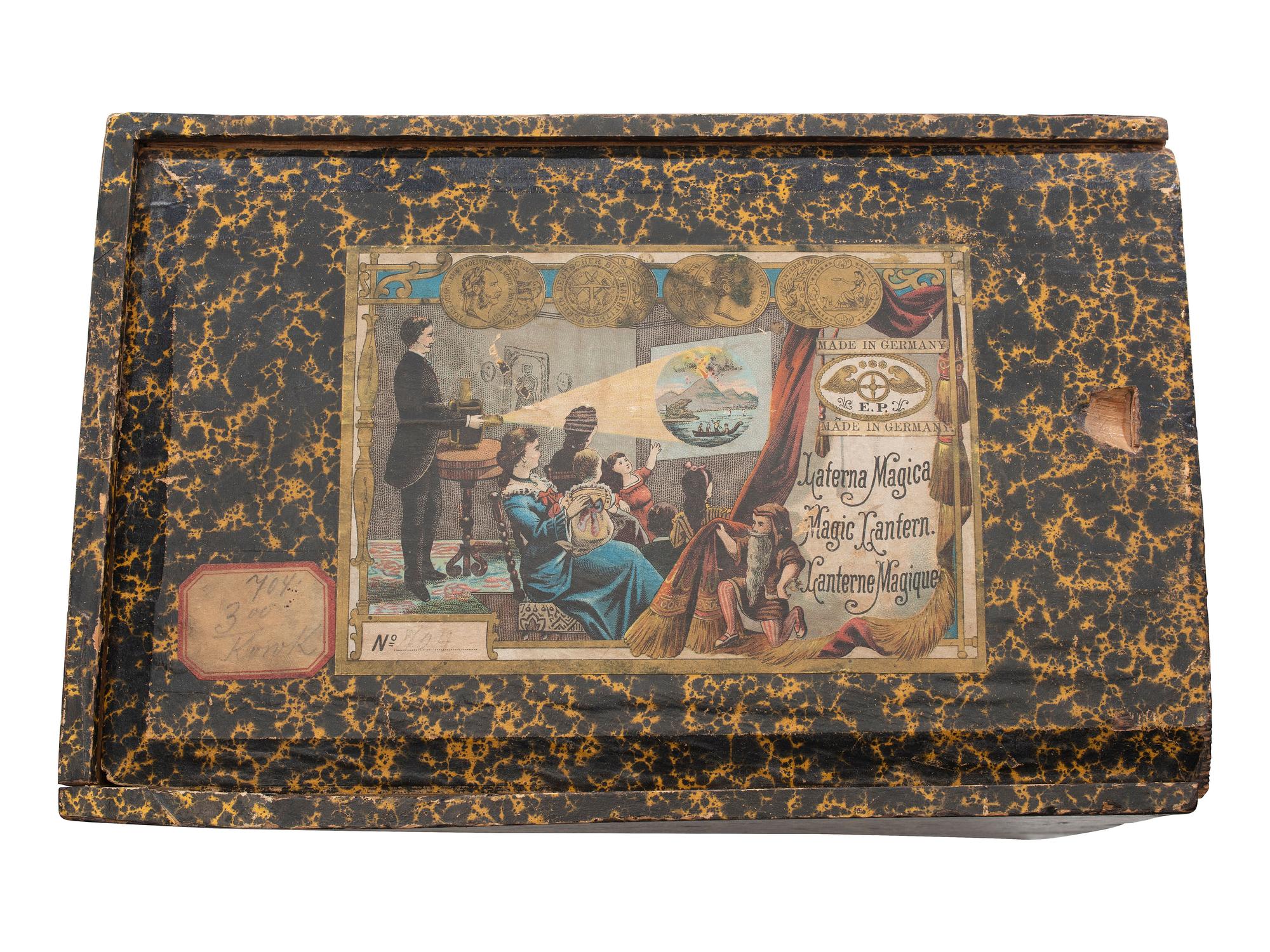 [EARLY PHOTOGRAPHY]. Magic Lantern projector in original box with matching box used to store slides.