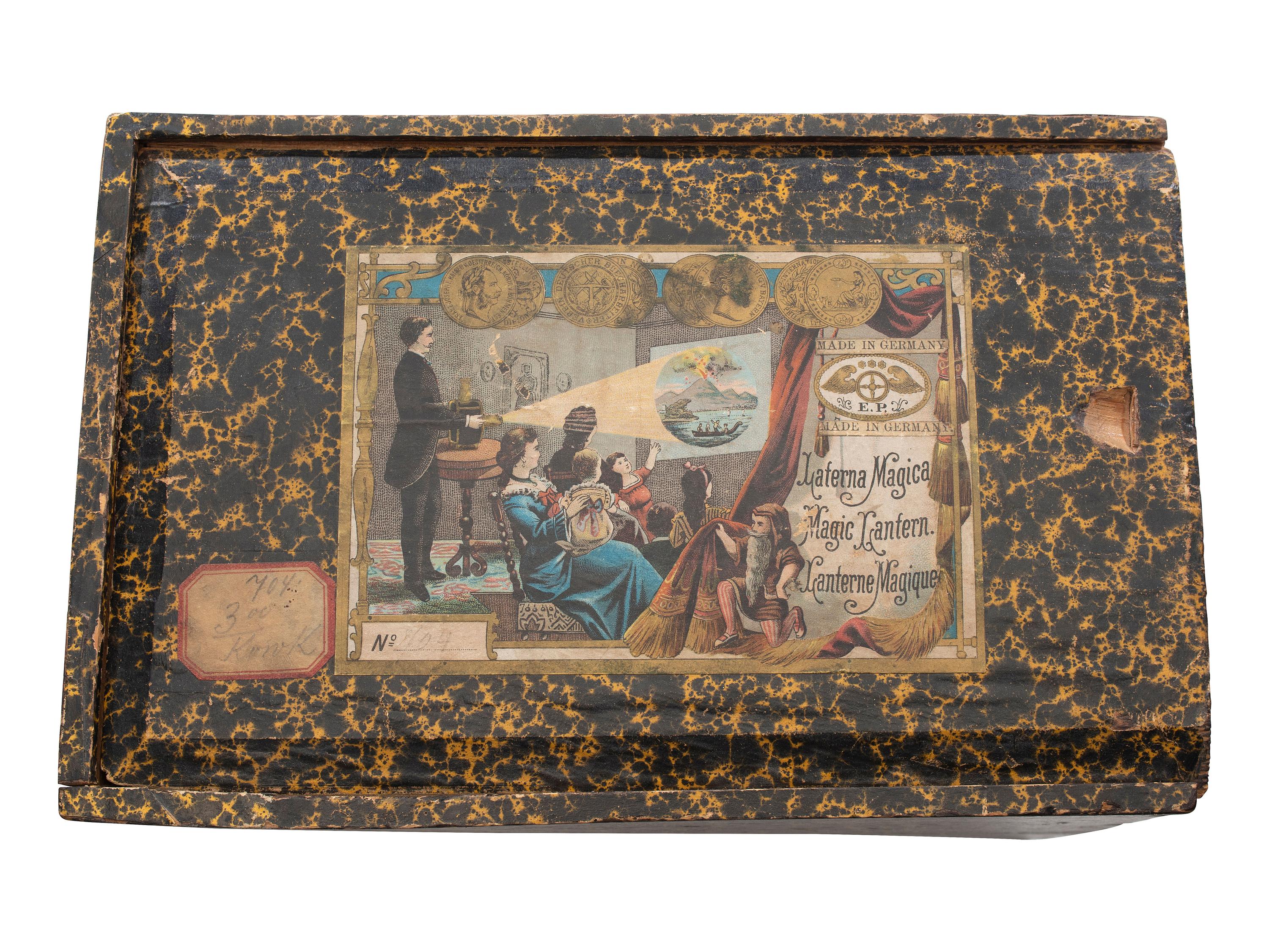 [EARLY PHOTOGRAPHY]. Magic Lantern projector in original box with matching box used to store slides.