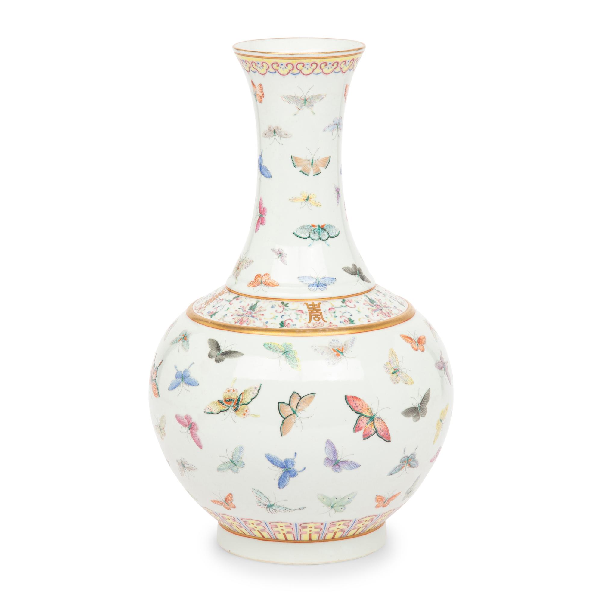 A Chinese Famille Rose 'Butterflies' Bottle Vase, Guangxu Six-Character Mark 光緒款 粉彩百蝶圖賞瓶