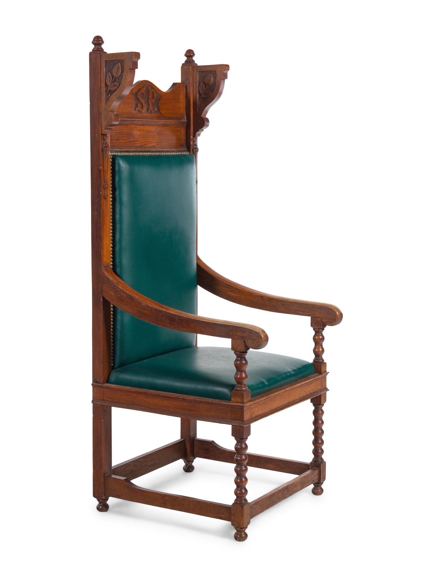 A Jacobean Style Carved Oak Armchair