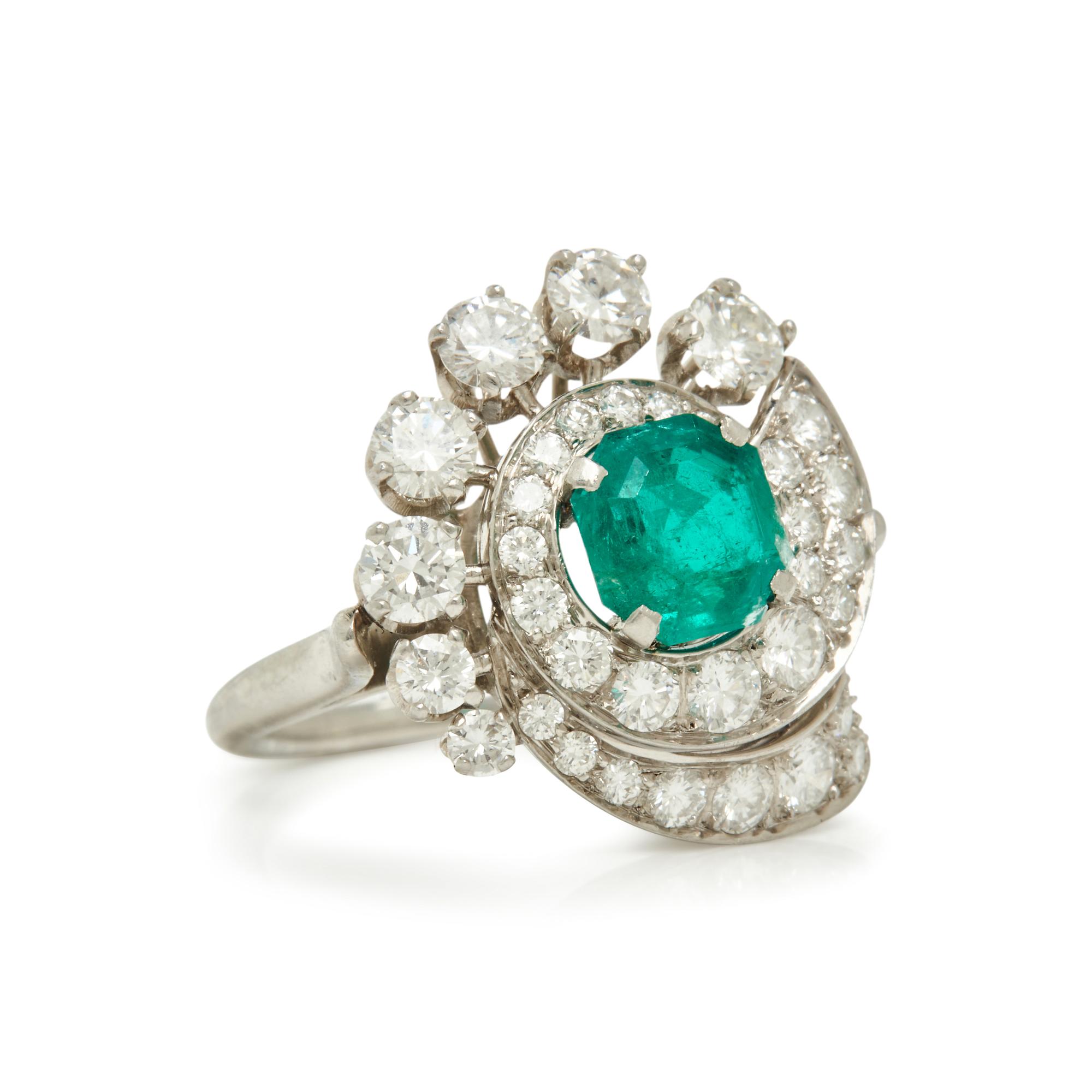 PLATINUM, EMERALD AND DIAMOND RING