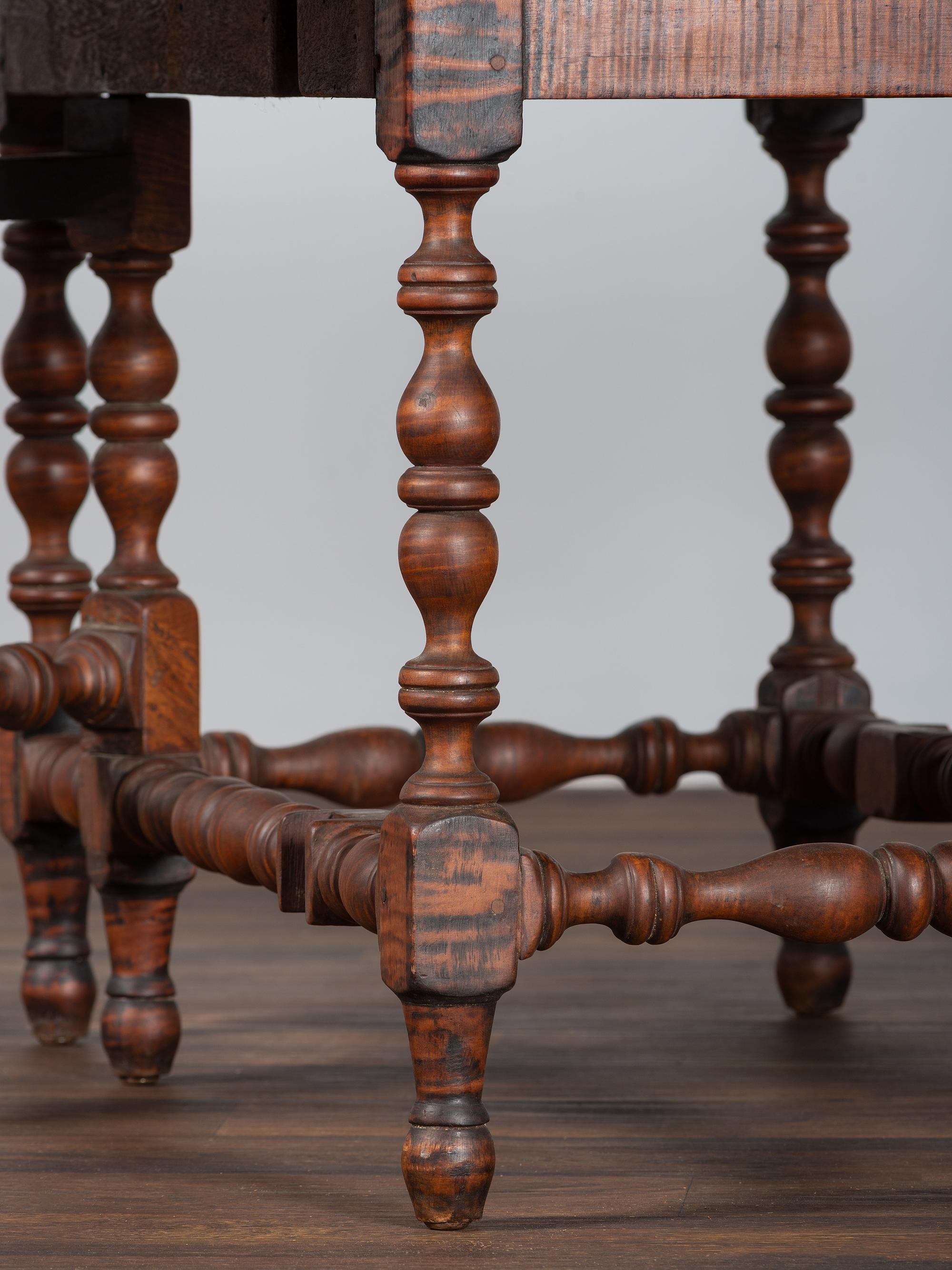 A William and Mary Figured Maple Drop Leaf Dining Table