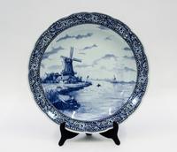 A Delft Charger Diameter 16 inches.