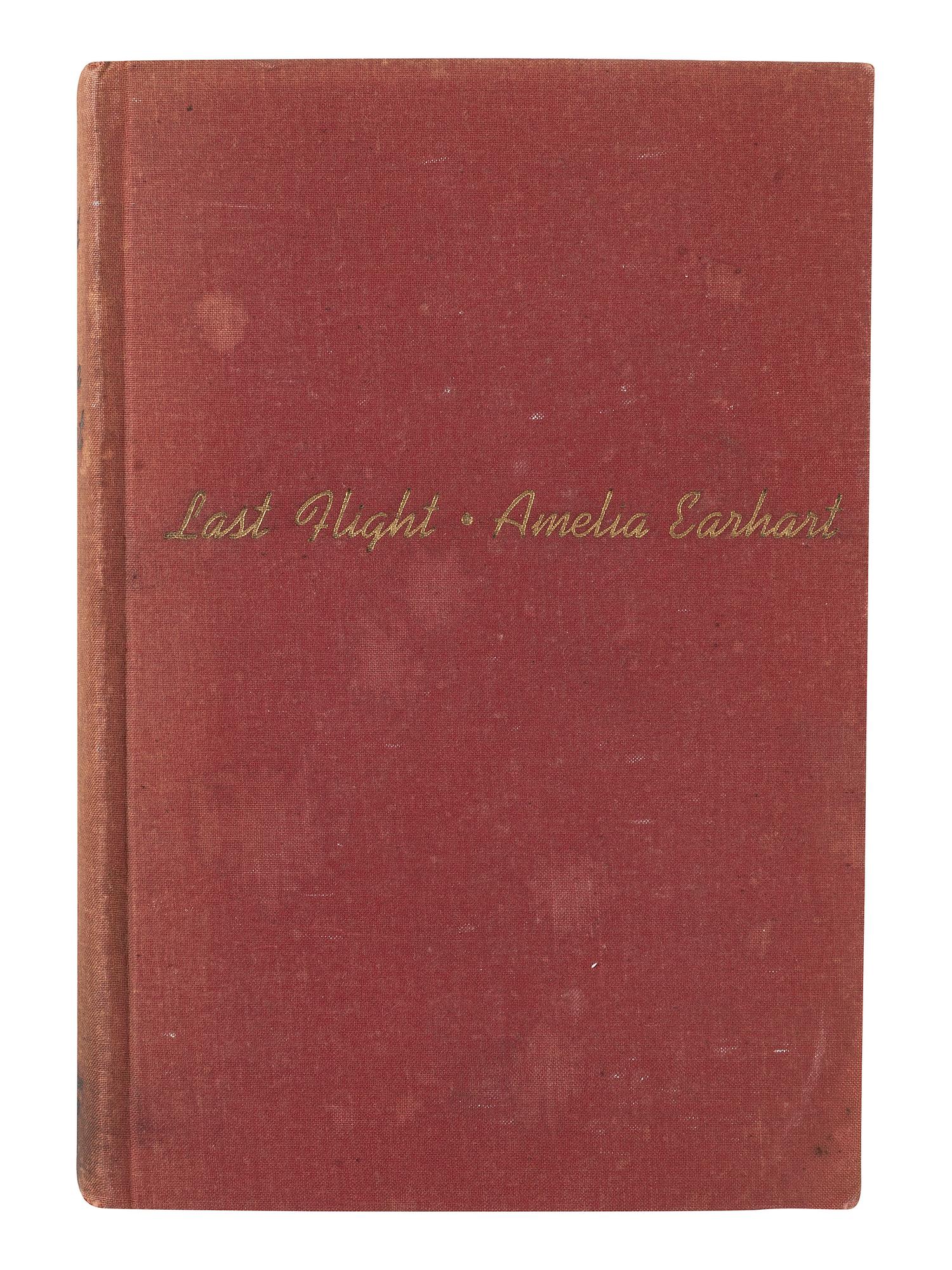 EARHART, Amelia (1897-1937). Photograph signed. [With:] Last Flight . 1937.