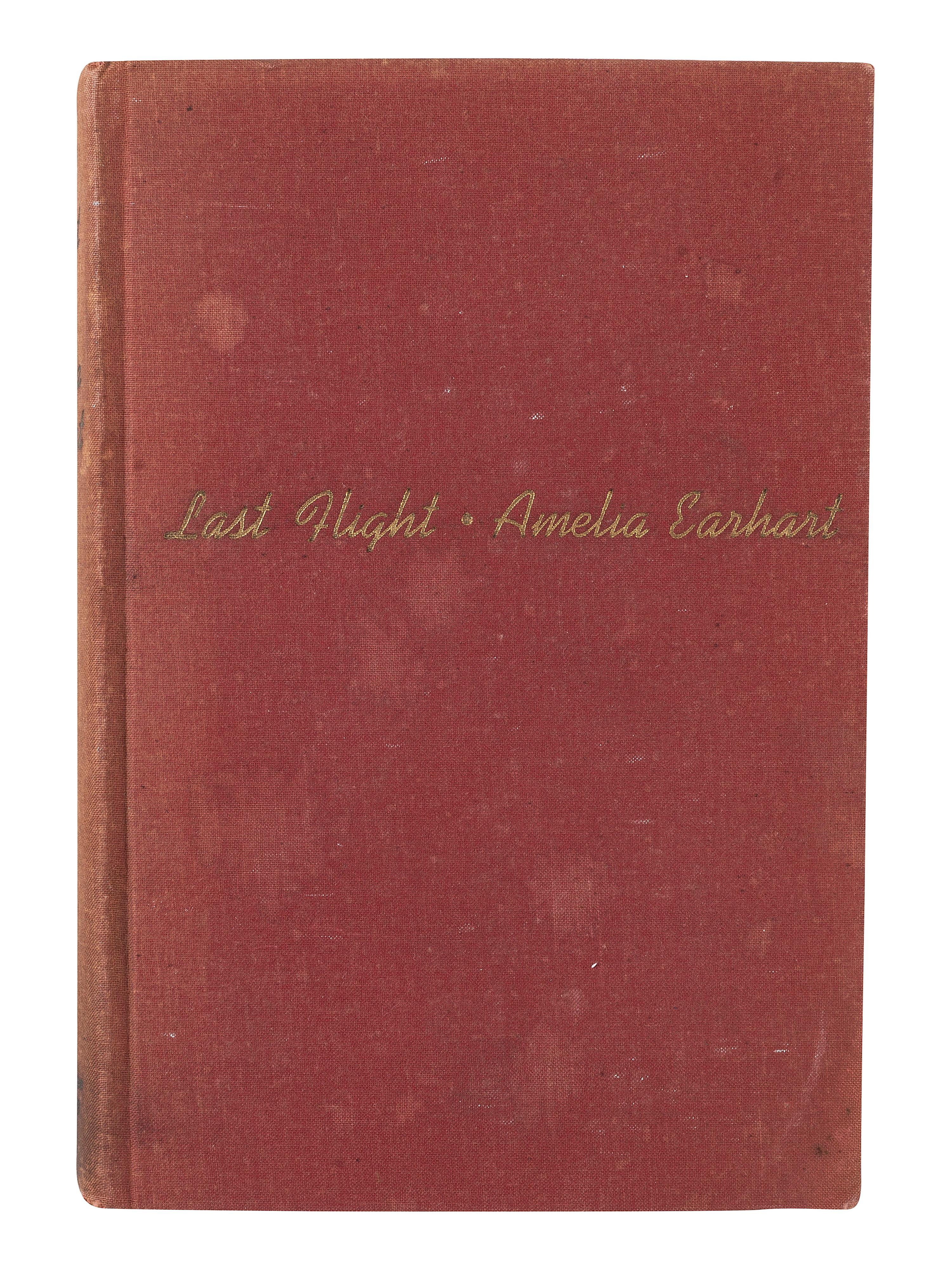 EARHART, Amelia (1897-1937). Photograph signed. [With:] Last Flight . 1937.