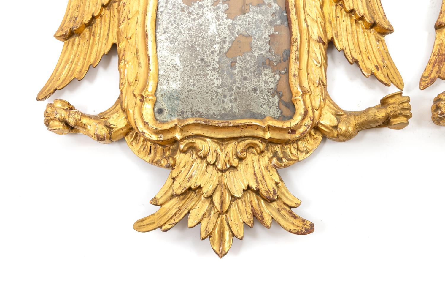 A Pair of Continental Giltwood Mirrors