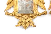 A Pair of Continental Giltwood Mirrors