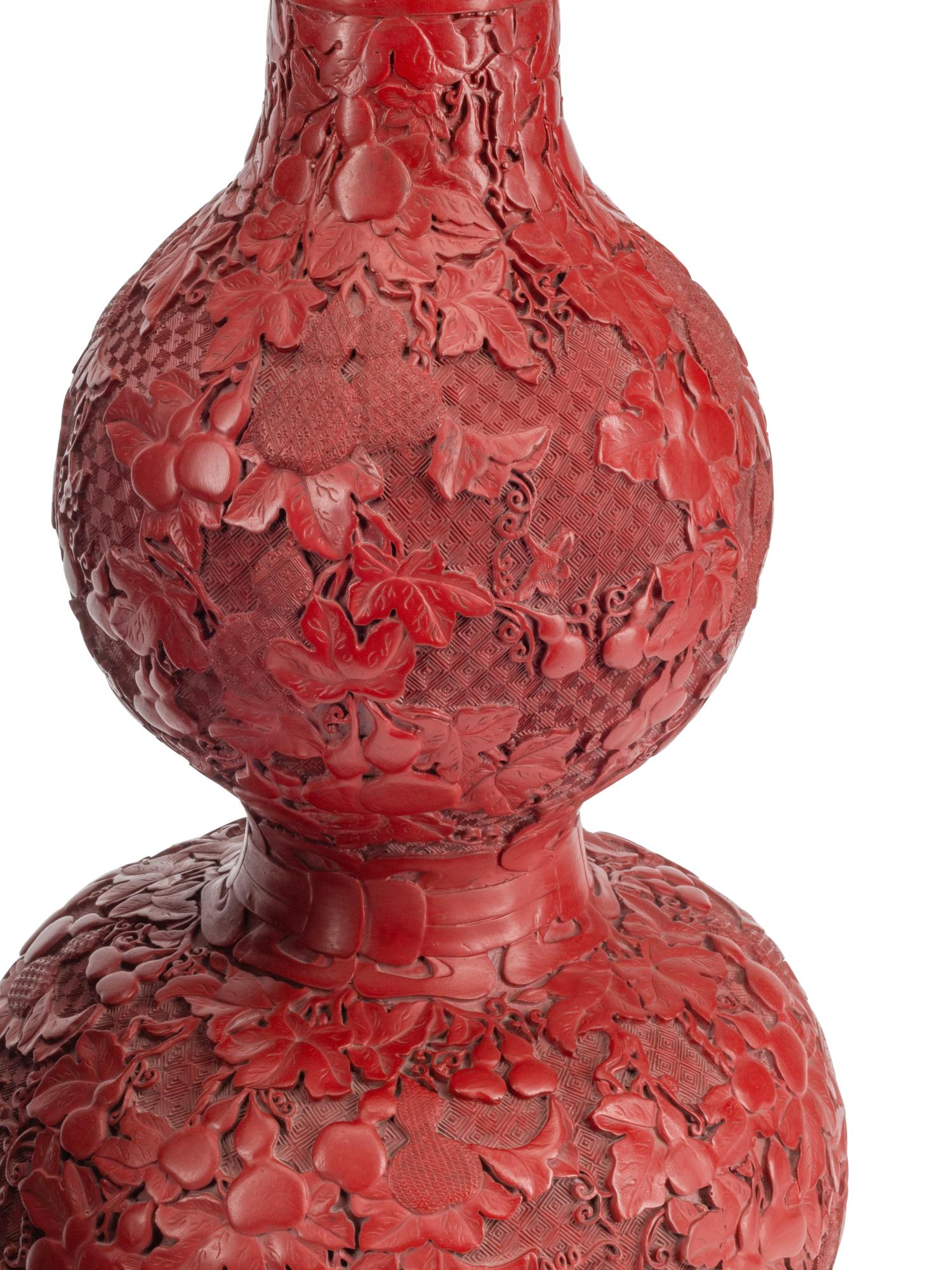 A Pair of Chinese Carved Red Lacquer Double-Gourd Vases