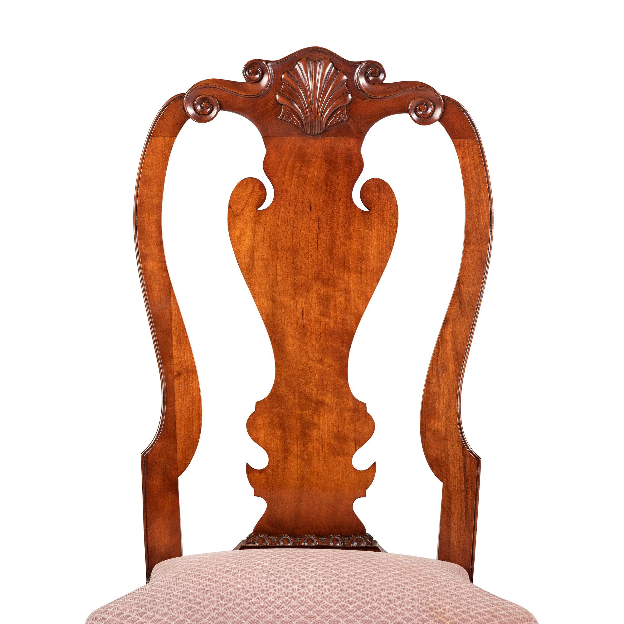 A Set of Four Queen Anne Style Shell and Volute Carved Cherrywood Compass-Seat Claw-and-Ball Foot Side Chairs