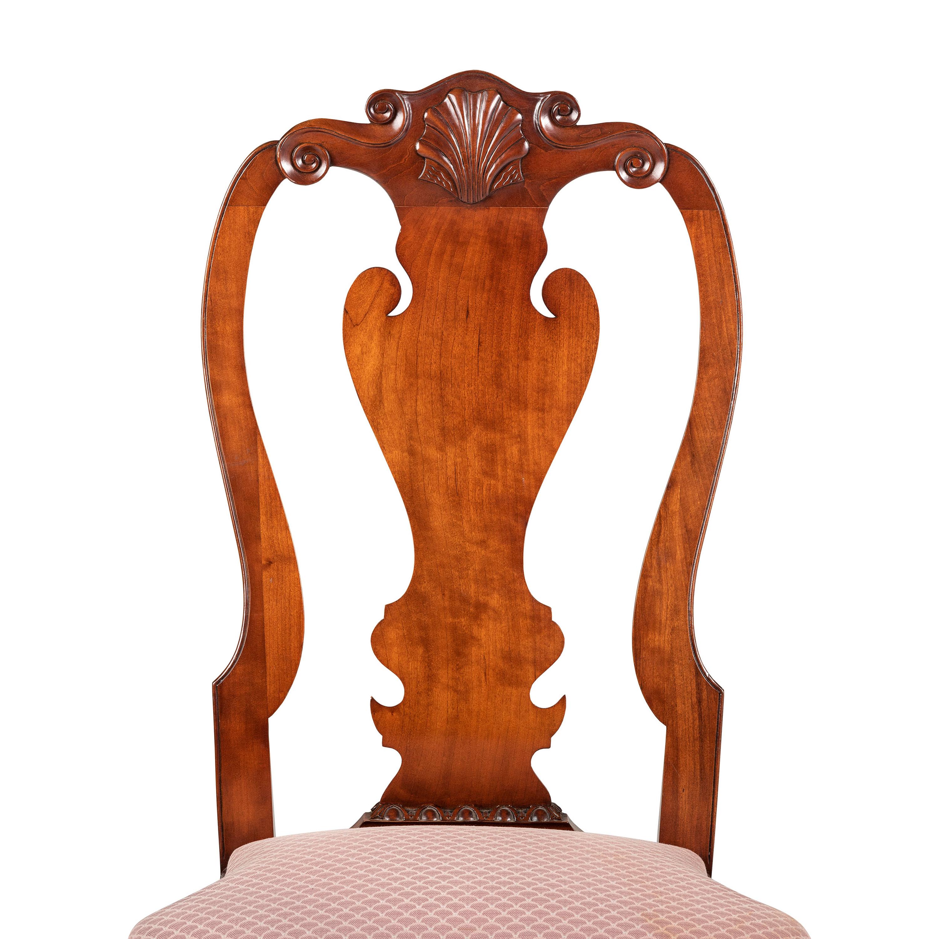 A Set of Four Queen Anne Style Shell and Volute Carved Cherrywood Compass-Seat Claw-and-Ball Foot Side Chairs