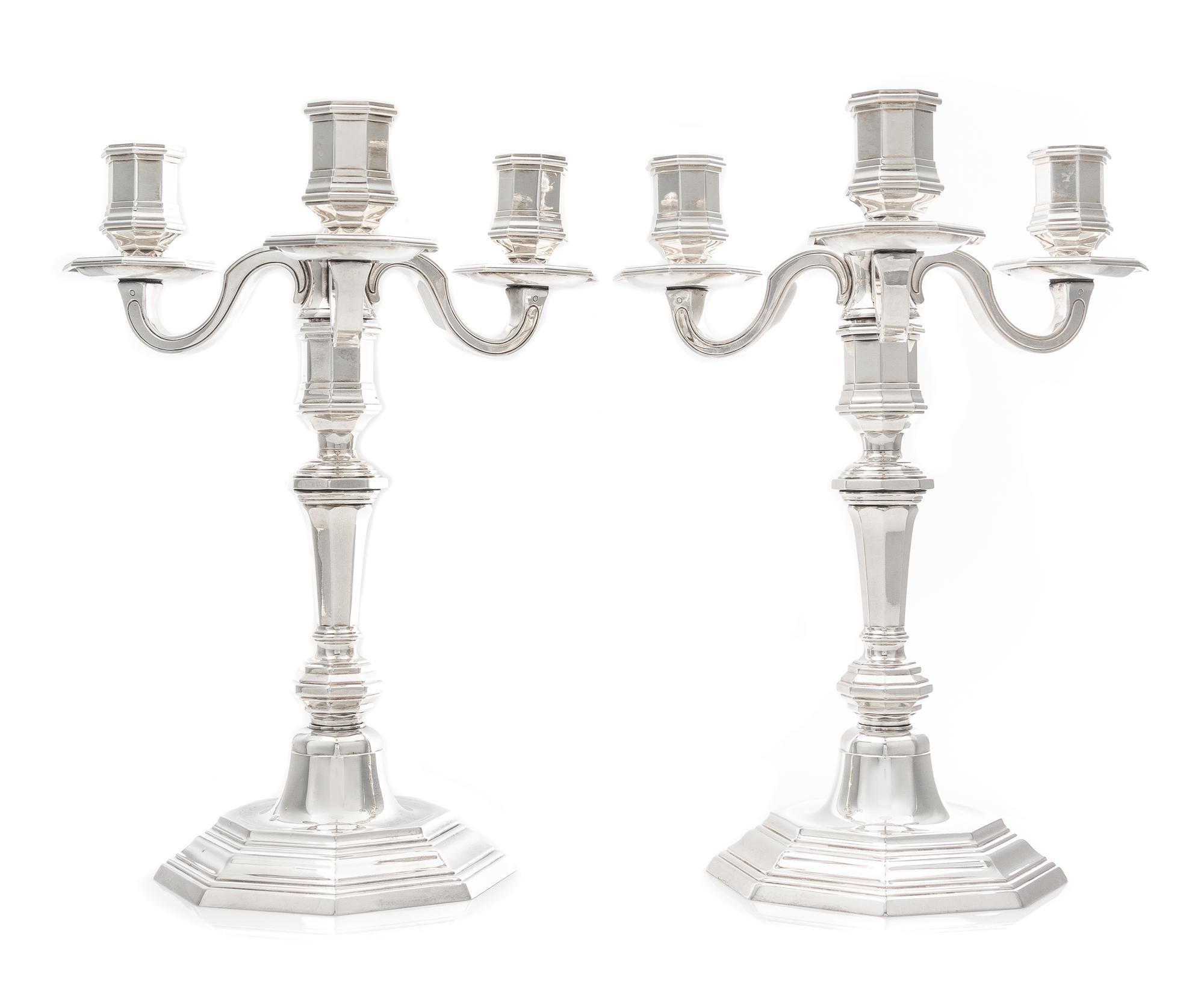 A Pair of French Silver-Plate Three-Light Candelabra, Christofle, Paris, 20th Century, each paneled baluster form stem terminating in a