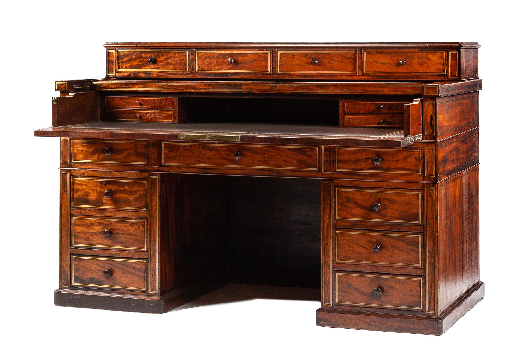 An English Brass Banded Mechanical Desk Height 42 1/2 x width 63 1/2 x depth 30 3/4 inches.