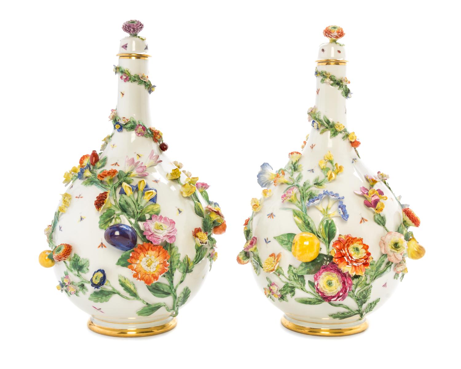A Pair of German Porcelain Vases and Covers Height 14 inches.
