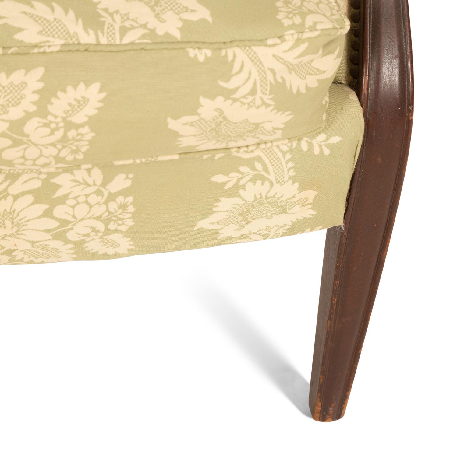 A Green and White Channel Upholstered Mahogany Armchair