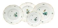 A Nymphenburg Porcelain Partial Dinner Service, Diameter of dinner plate 10 1/4 inches.