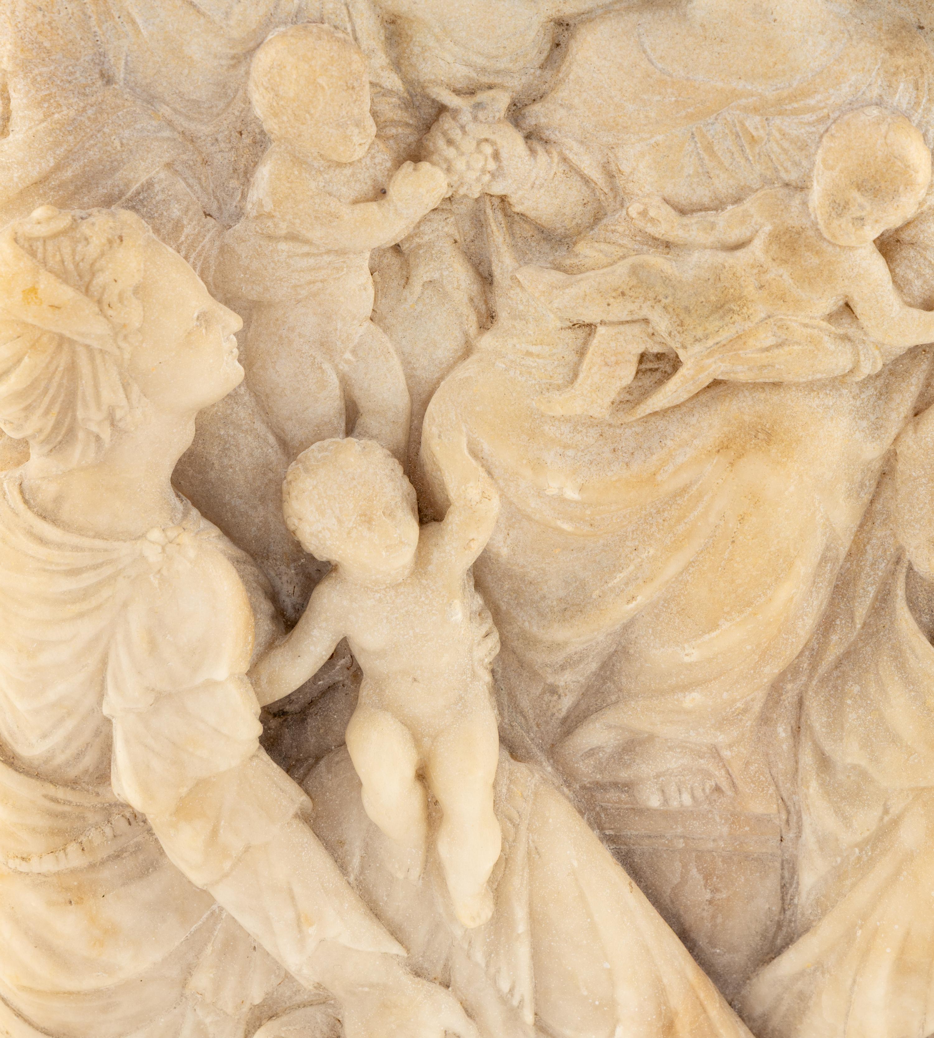 A Continental Carved Marble Relief Plaque