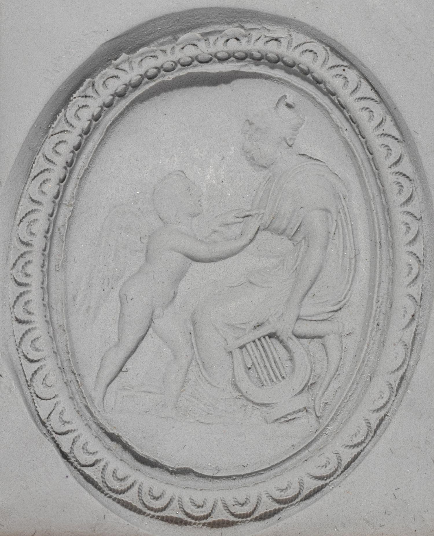 A Neoclassical Gold and Carnelian Brooch with Goddess Venus and Eros