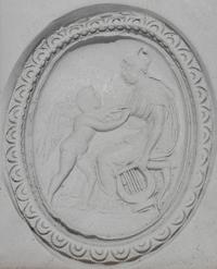 A Neoclassical Gold and Carnelian Brooch with Goddess Venus and Eros