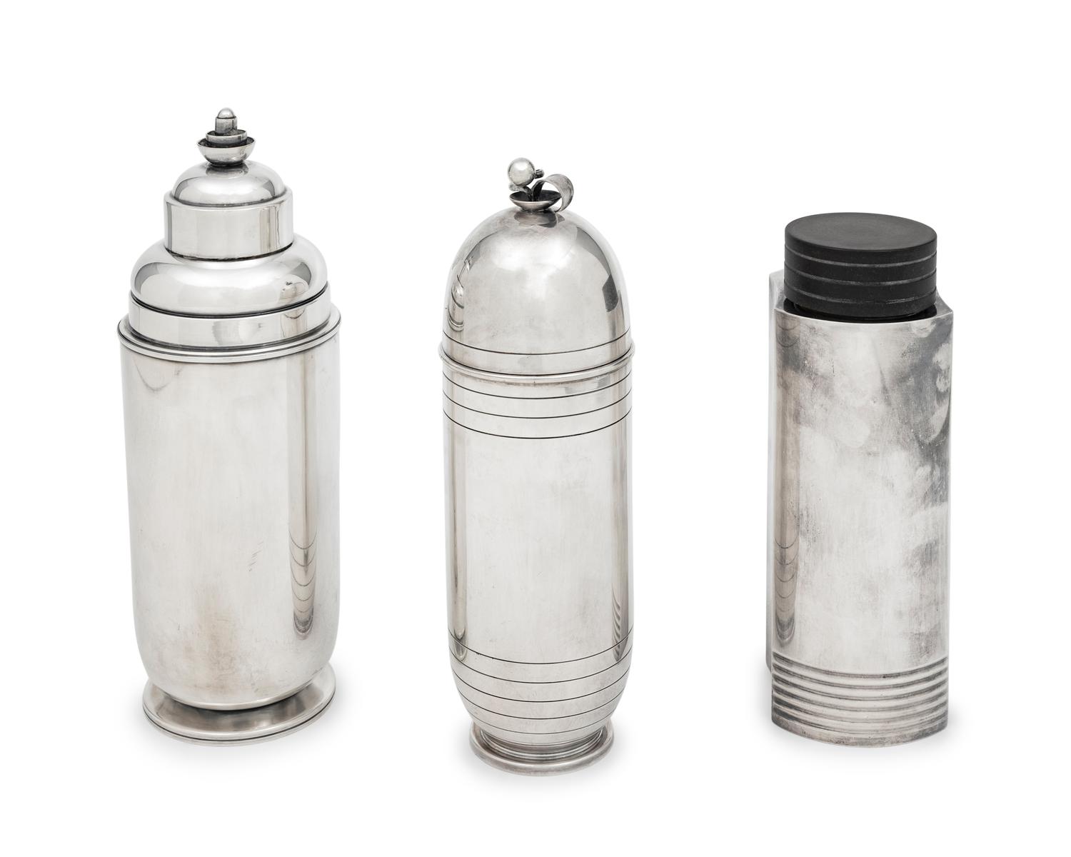 A Group of Three Cocktail Shakers