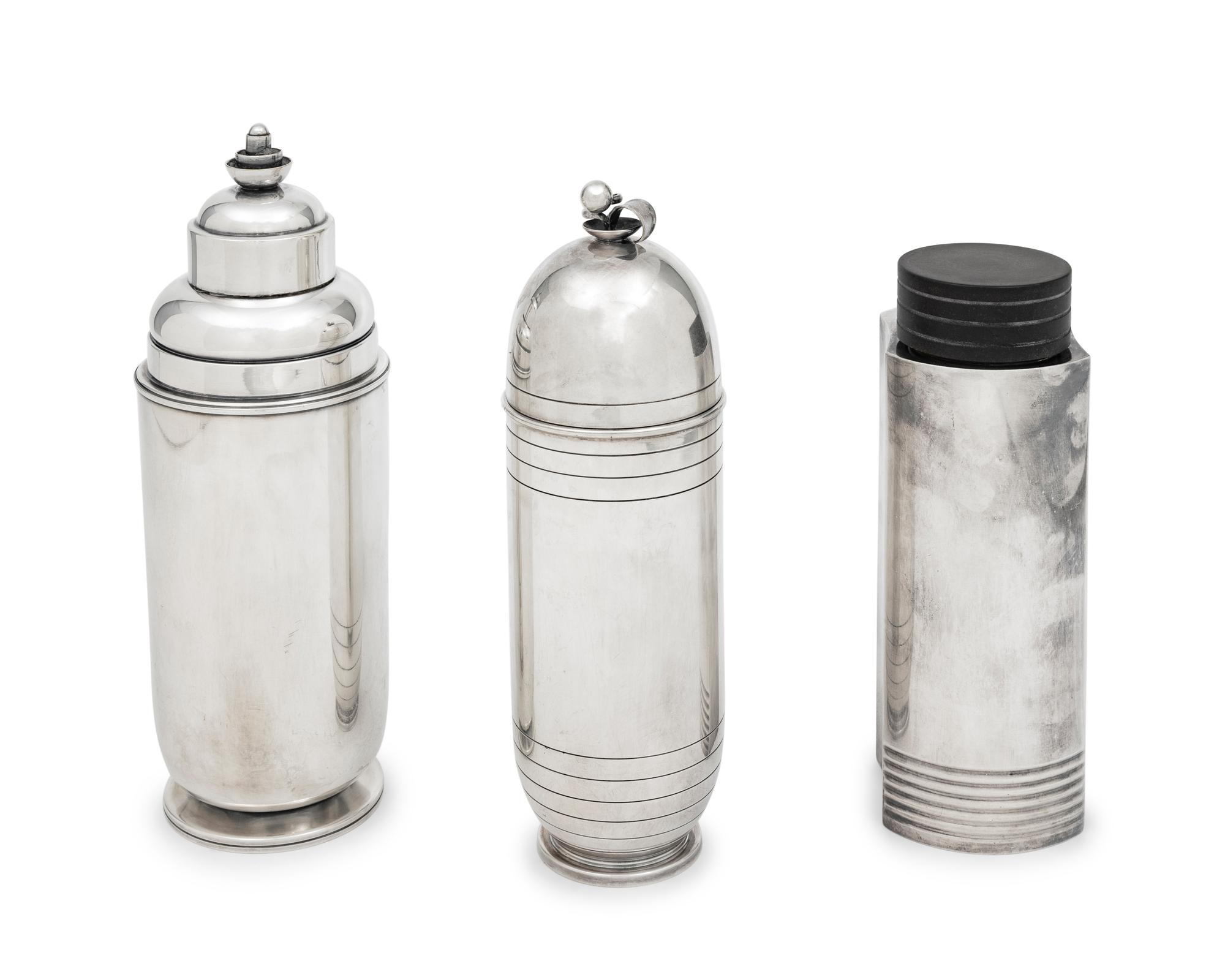 A Group of Three Cocktail Shakers