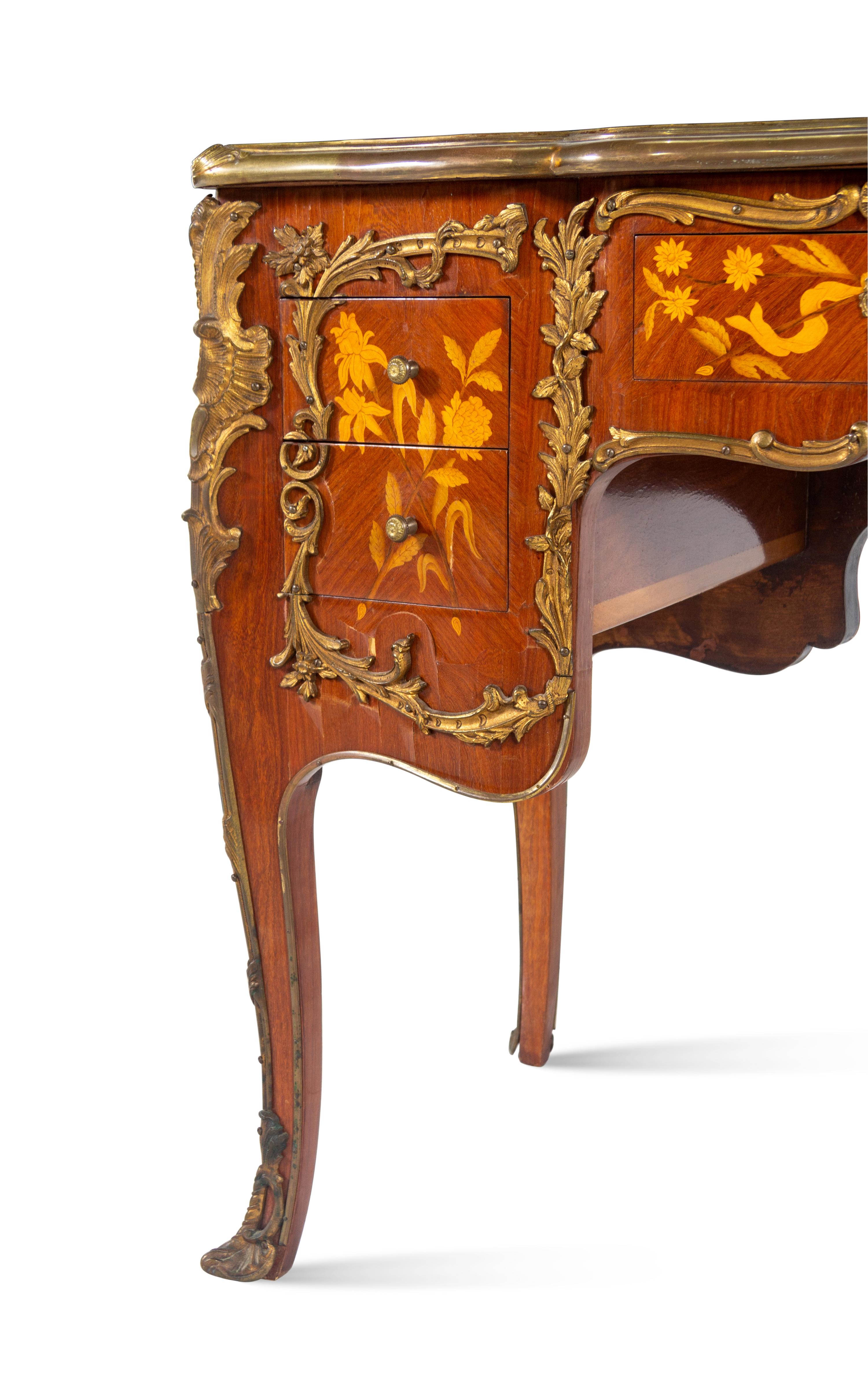 A Louis XV Style Gilt Bronze Mounted Marquetry Desk