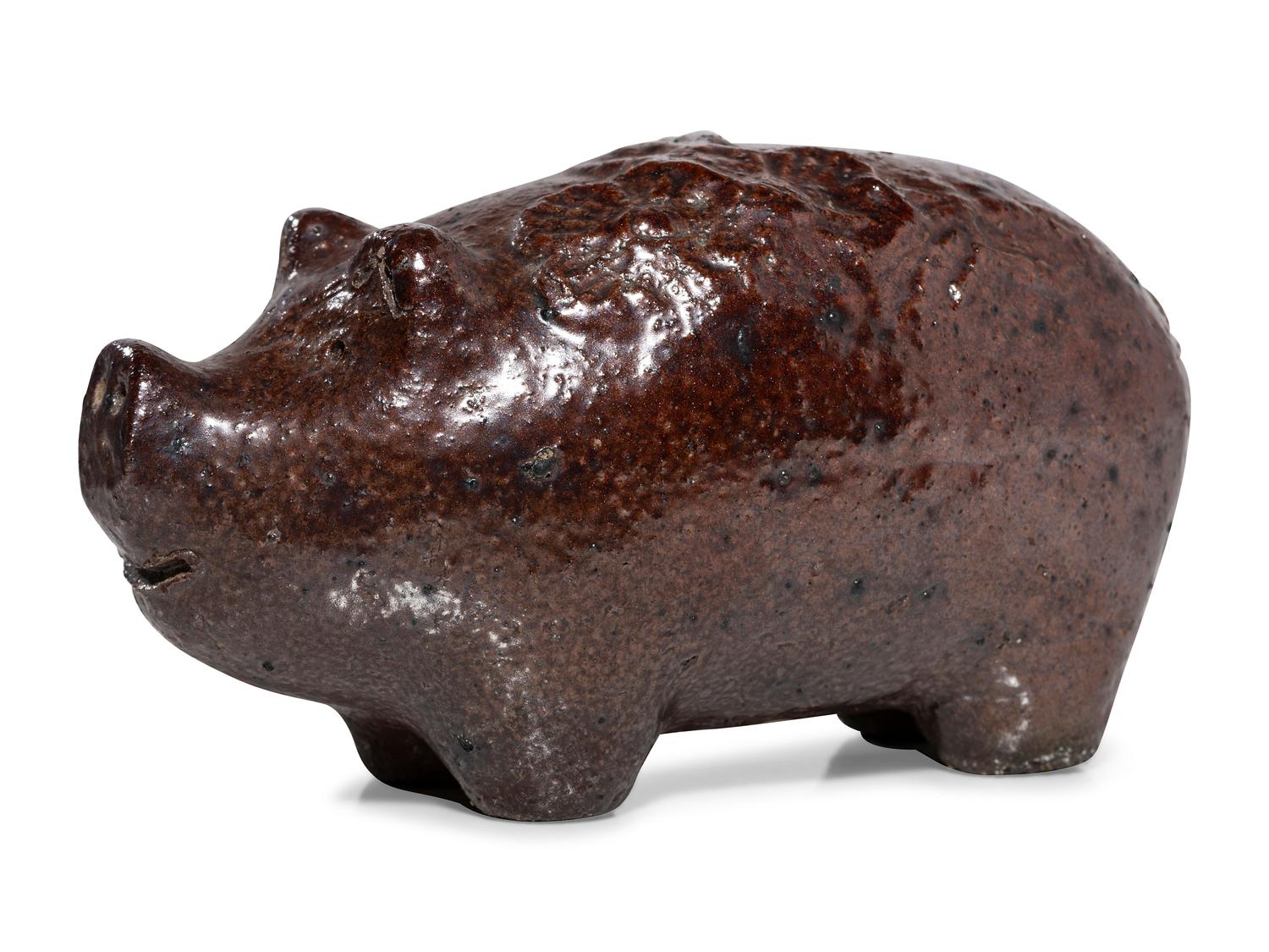An Ohio Brown-Glazed Sewer Tile Pig