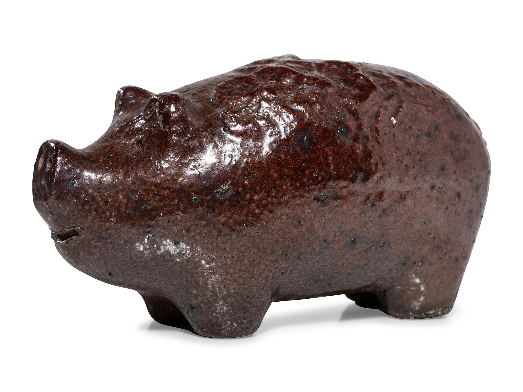 An Ohio Brown-Glazed Sewer Tile Pig